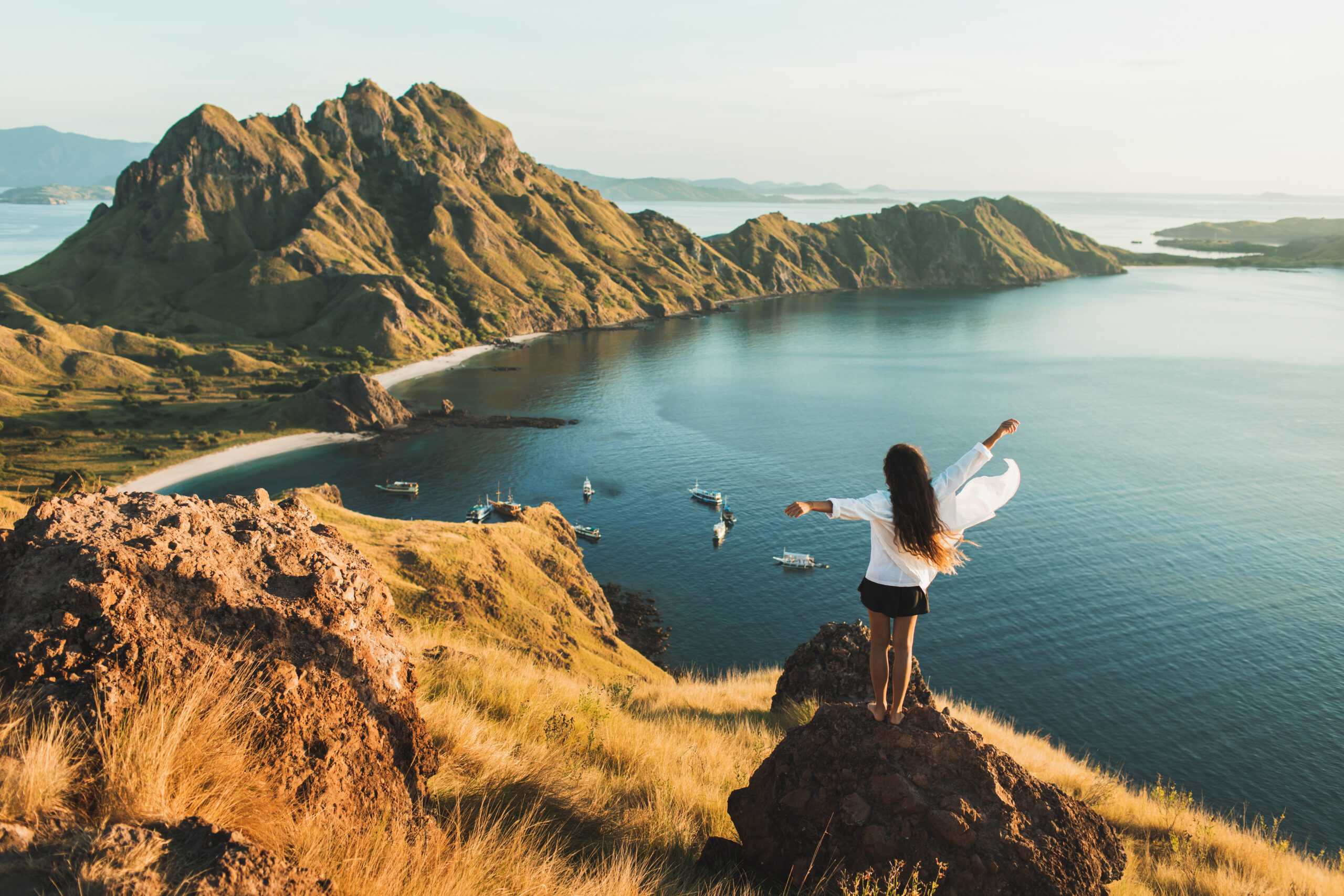 Woman,With,Amazing,View,Of,Padar,Island,In,Komodo,National